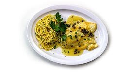 Spaghetti with Fish filets in a yellow capers sauce